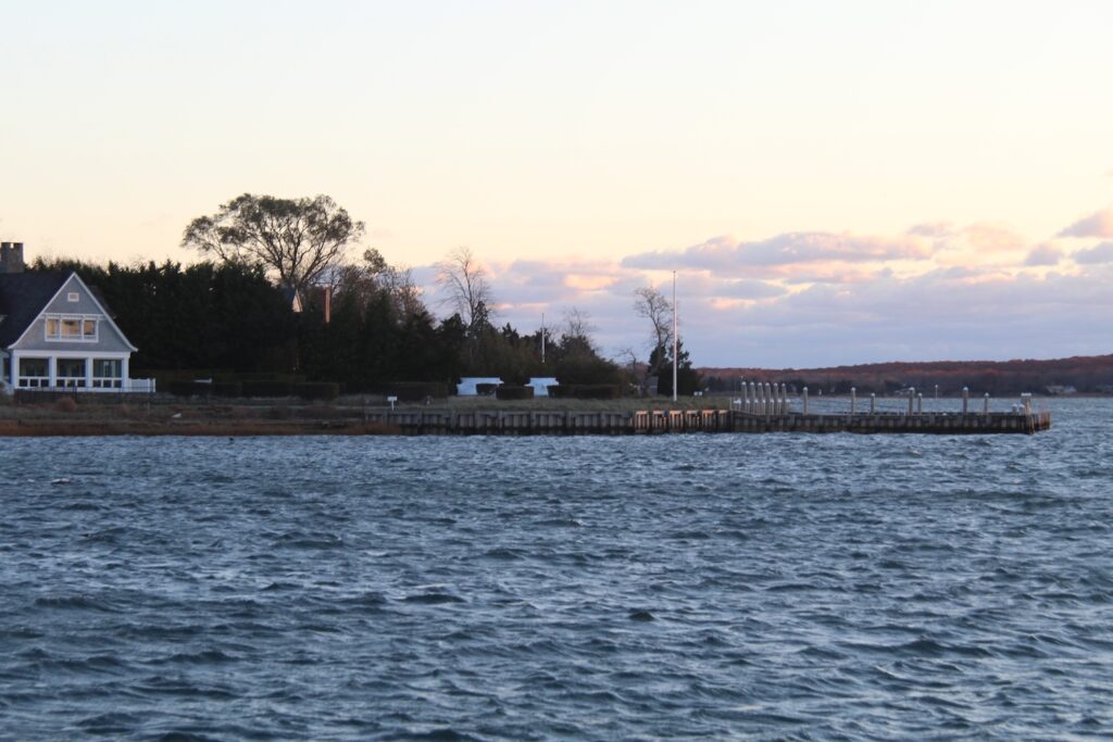 Photo of Three Mile Harbor and bulkhead with dock.