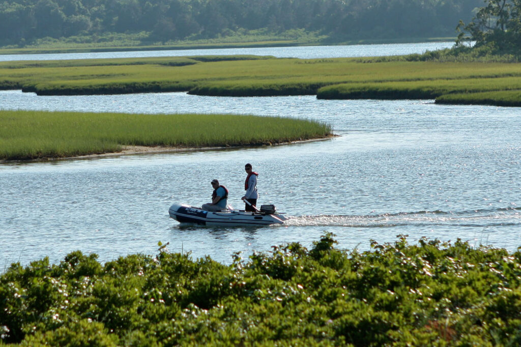 Accabonac Harbor skiff with fishermen