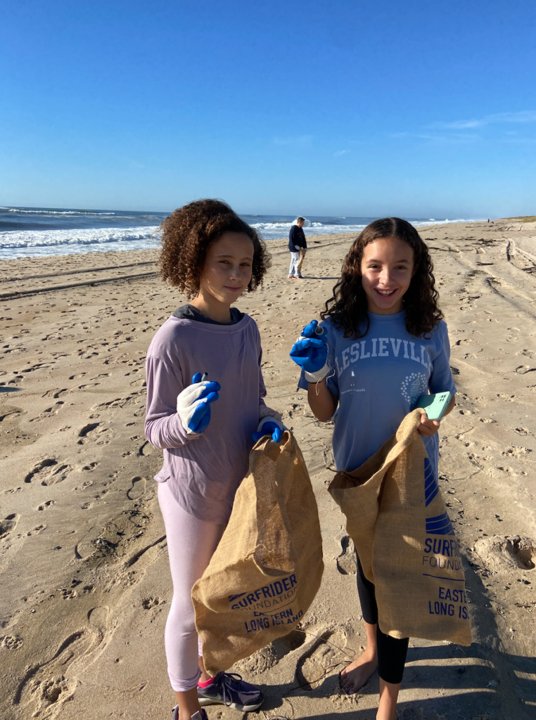 EH Middle School Students beach clean up ter & clam seeds September 2022