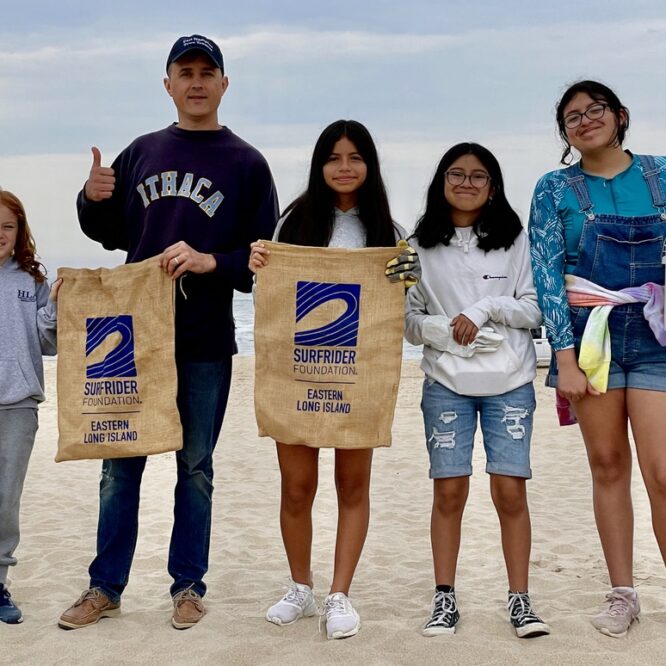 East Hampton Middle School Surfrider Club students and Trustee and teacher, David Cataletto Beach Clean Up EH Litter Action Committee