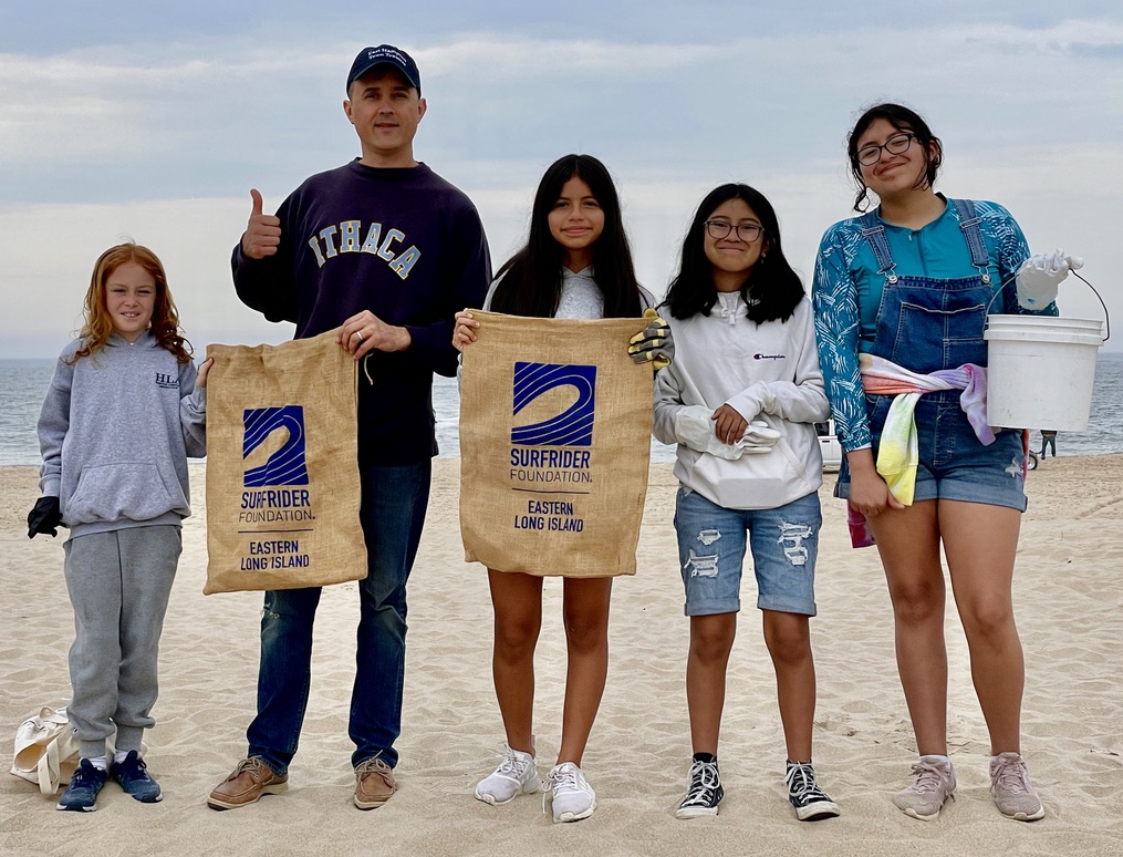 East Hampton Middle School Surfrider Club students and Trustee and teacher, David Cataletto Beach Clean Up EH Litter Action Committee
