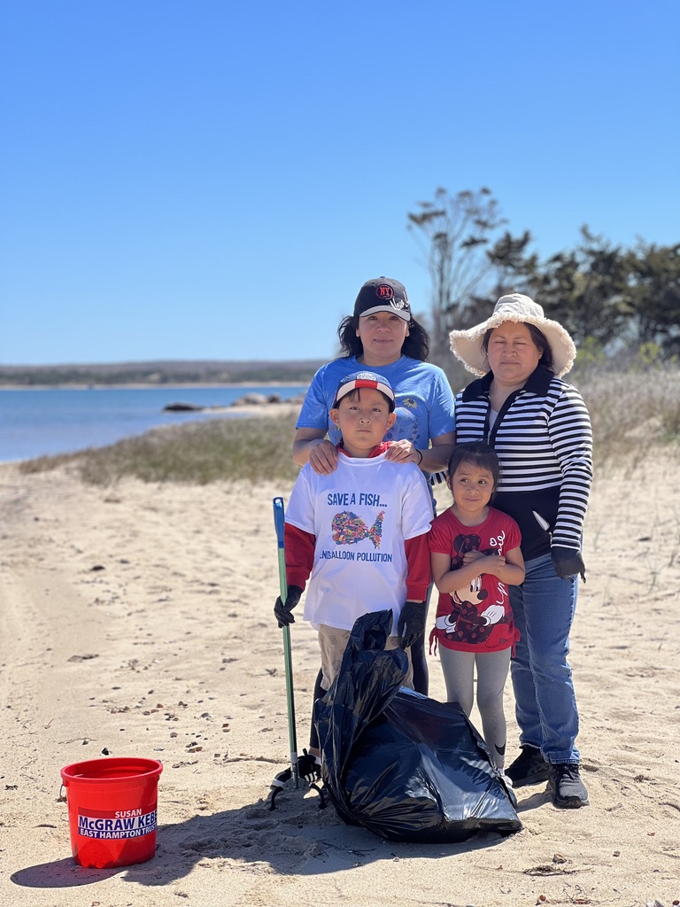 Students and their family at the beach clean-up of Lazy Point