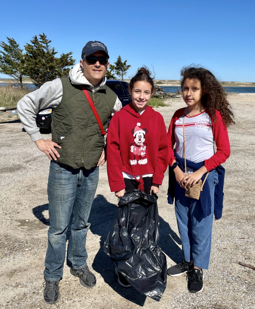 Trustee David Cataletto and EH Middle School students beach clean up May 6 2023