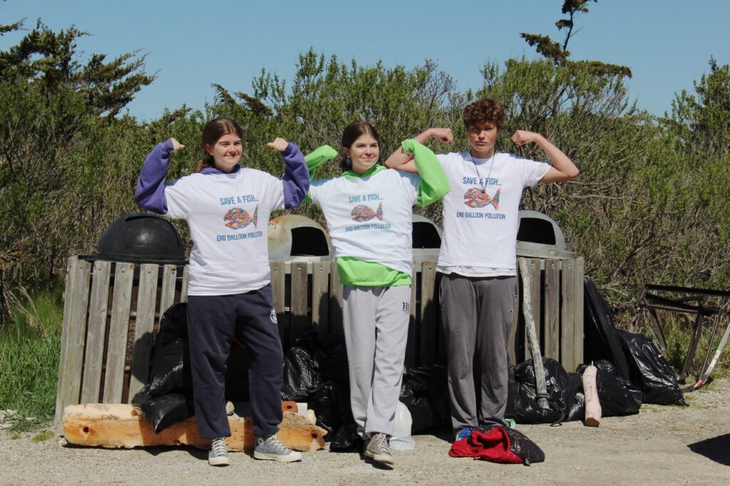 EHHS freshmen students flexing their muscles- beach cleanup crew strength in numbers!