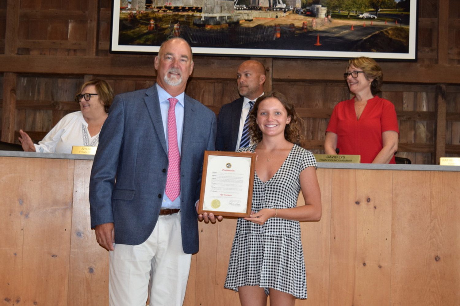 Recognition by the town of Skye Tanzmann & Nick Cooper of their efforts to construct an oyster reef in Accabonac Harbor this Spring 2023. Supervisor Peter Van Scoyoc presented the certificate. Photo Christopher Walsh