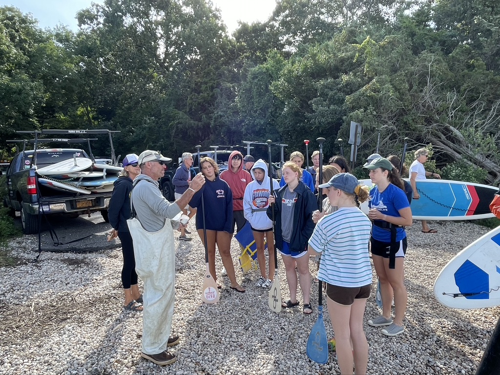 Barley and students before heading out on the harbor with oyster and clam seeds