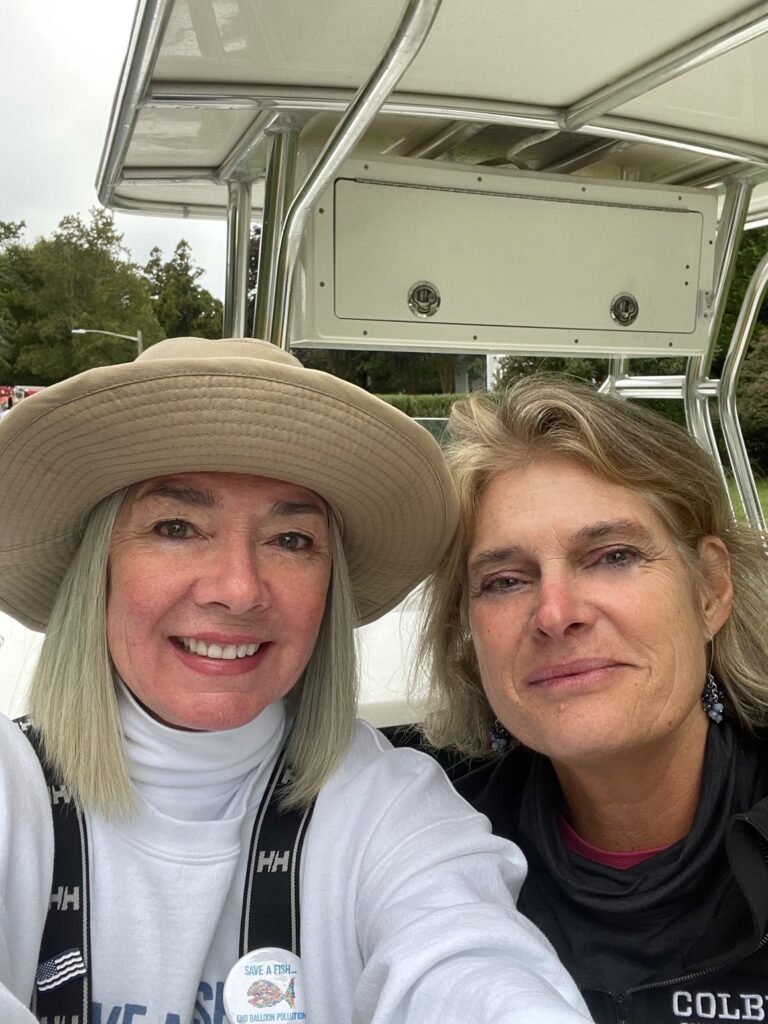 Friends- oyster farmers- Trustees - Southampton Town Trustee Ann Welker and East Hampton Town Trustee Susan McGraw-Keber on the pump-out boat before the parade begins.