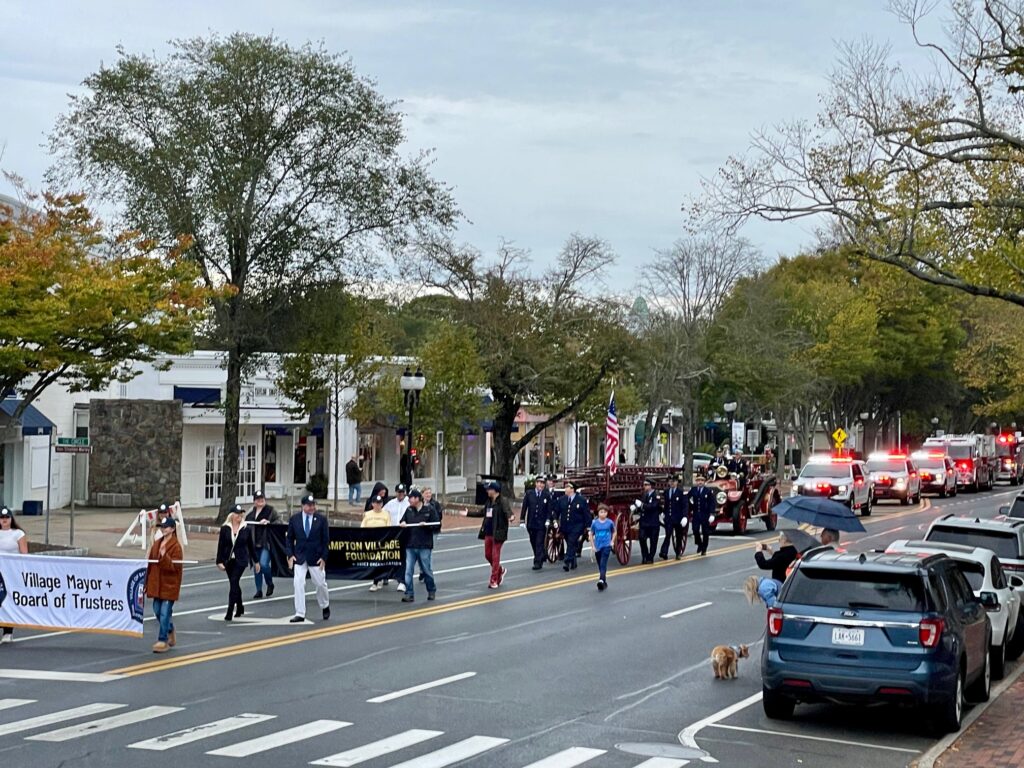 Village Mayor and Board of Trustees and the East Hampton Village Foundation with Mayor Jerry Larsen and his wife Lisa followed by antique hook and ladder and firetrucks from all the hamlets of East Hampton.
