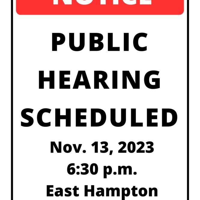 Image of a white and red sign reading, "Notice. Public Hearing Scheduled. Nov. 13, 2023 East Hampton Town Hall