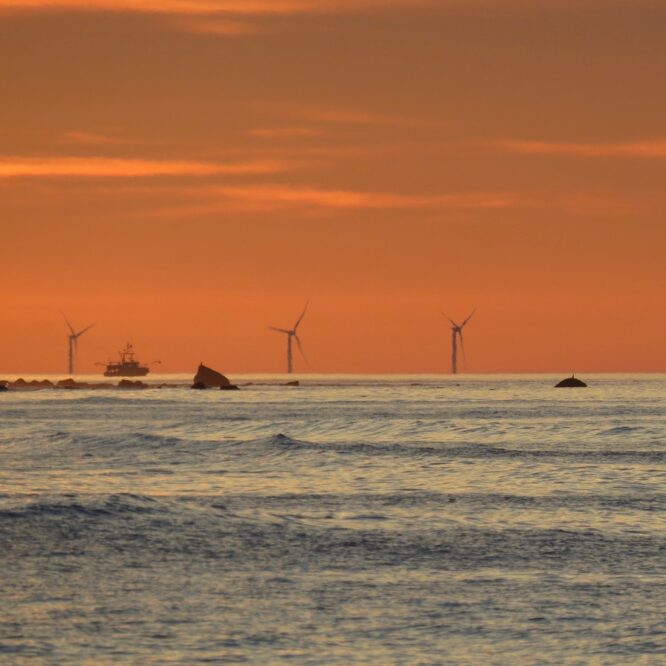 Block Island wind turbines as seen from the beach in Montauk. Jane Bimson
