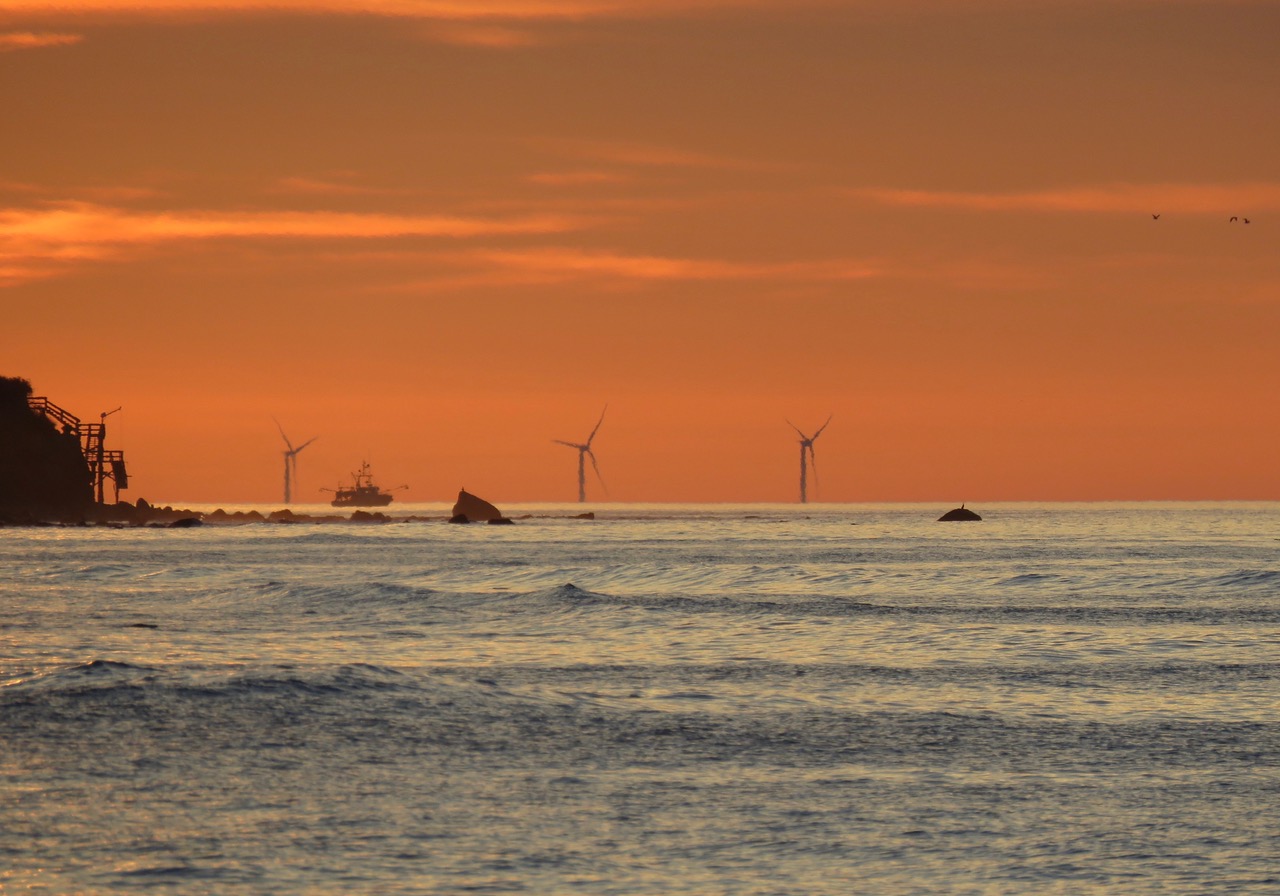 Block Island wind turbines as seen from the beach in Montauk. Jane Bimson