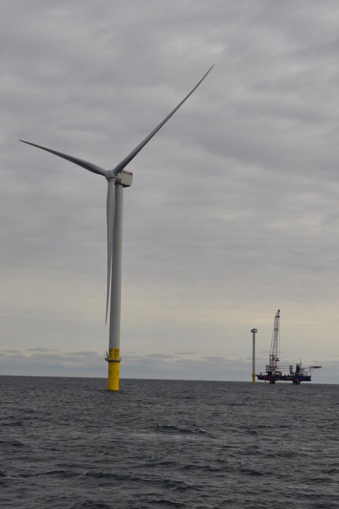 Orsted US wind turbine is operational - the boat is approaching it.