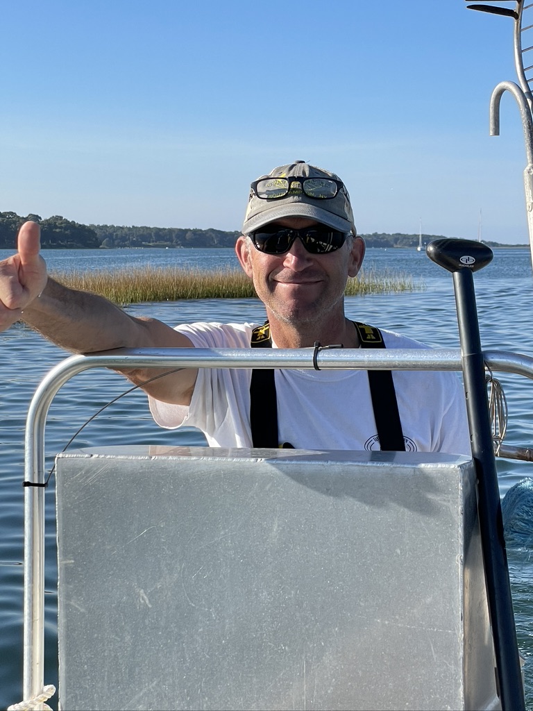 John "Barley" Dunne , Director of the East Hampton Shellfish Hatchery - Seeding on Three Mile Harbor with the students of EH Middle School 2023