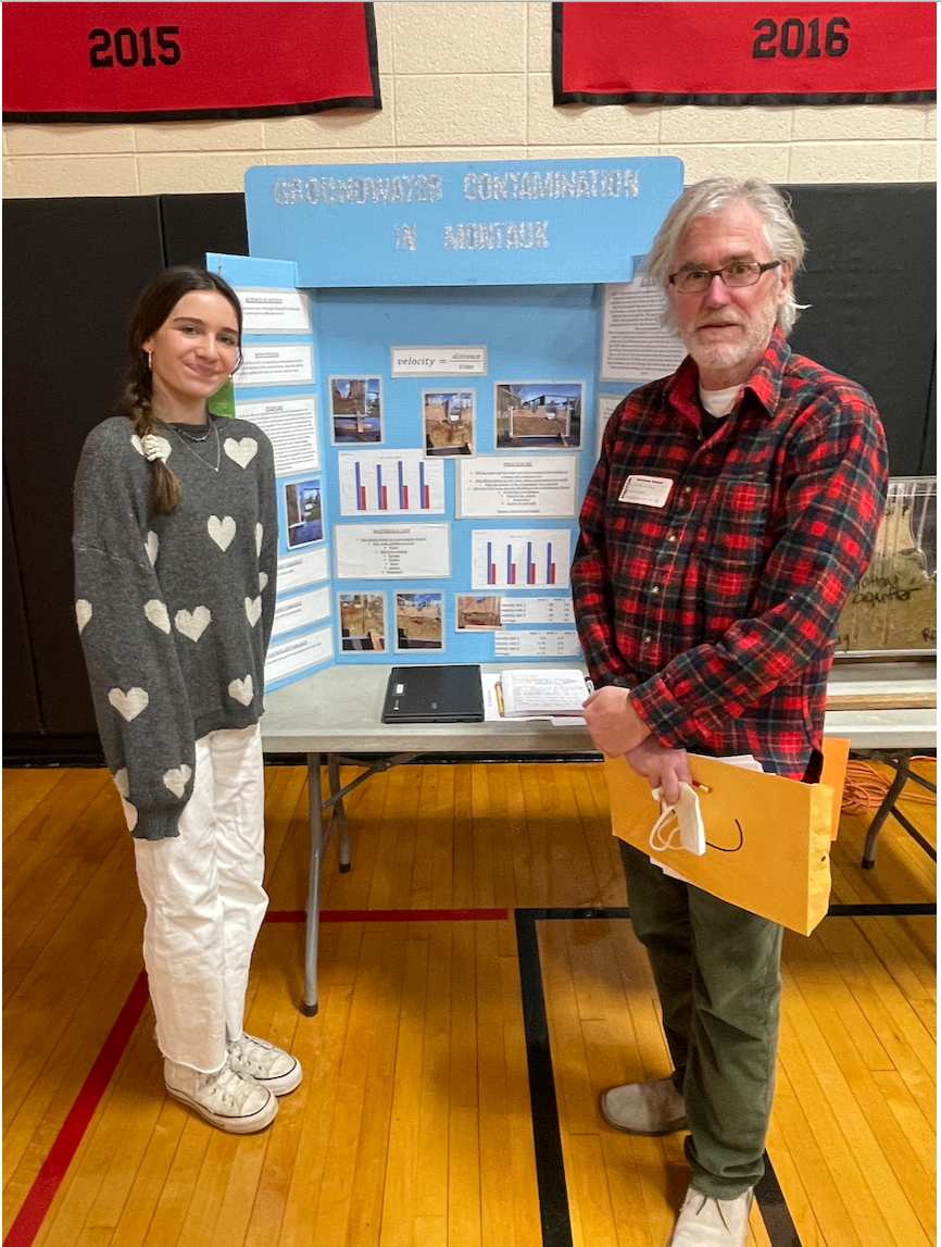 8th Grade student Valentia Balducci & Concerned Citizens of Montauk VP Andy Harris at Montauk School Science Fair 2024