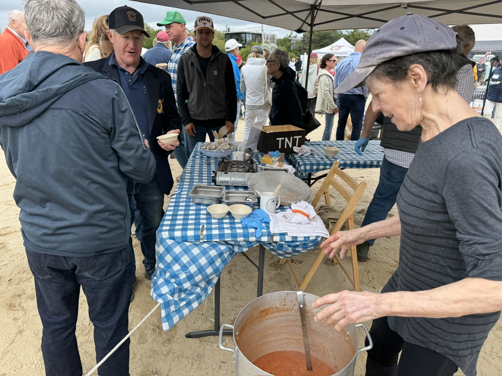 John Ryan Jr. samples clam chowder-