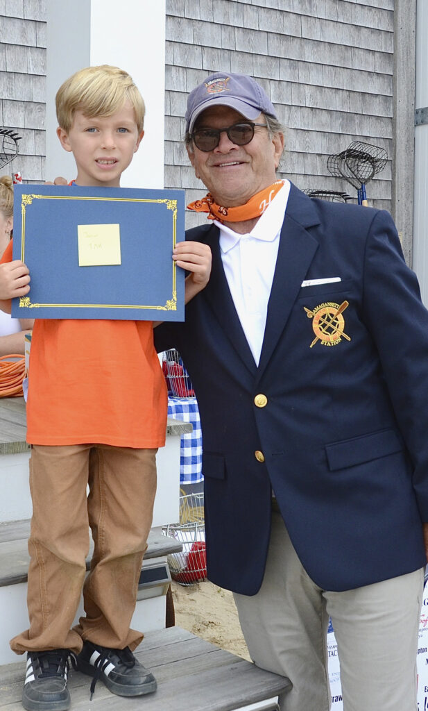 Junior Winner of the Largest Clam Contest Wesley Aldred and Michael Cinque of the Amagansett Life Saving Station