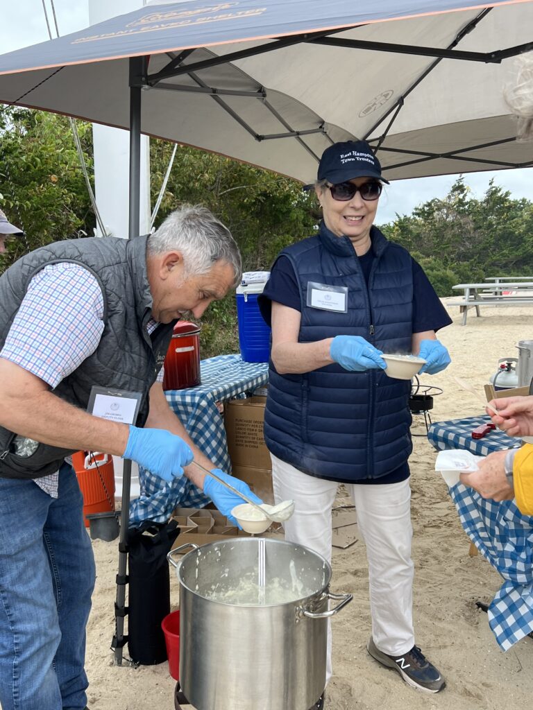 Deputy Clerk Jim Grimes and Trustee Celia Josephsen ladling out the New England Clam Chowder.