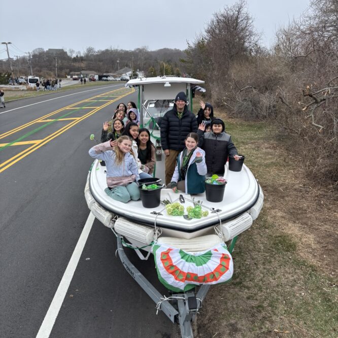 Montauk Friends of Erin Parade Trustees boat and school students