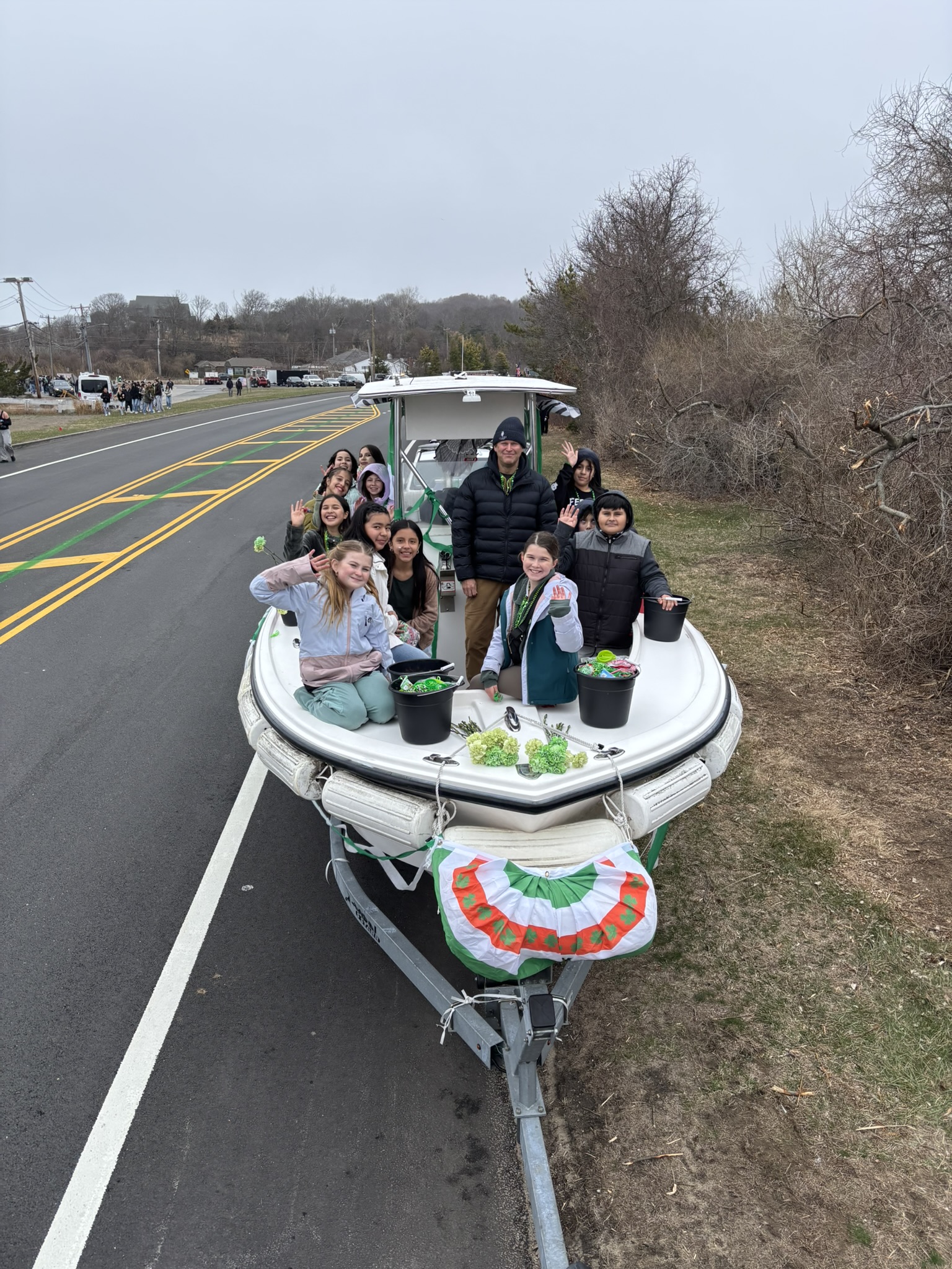 Montauk Friends of Erin Parade Trustees boat and school students