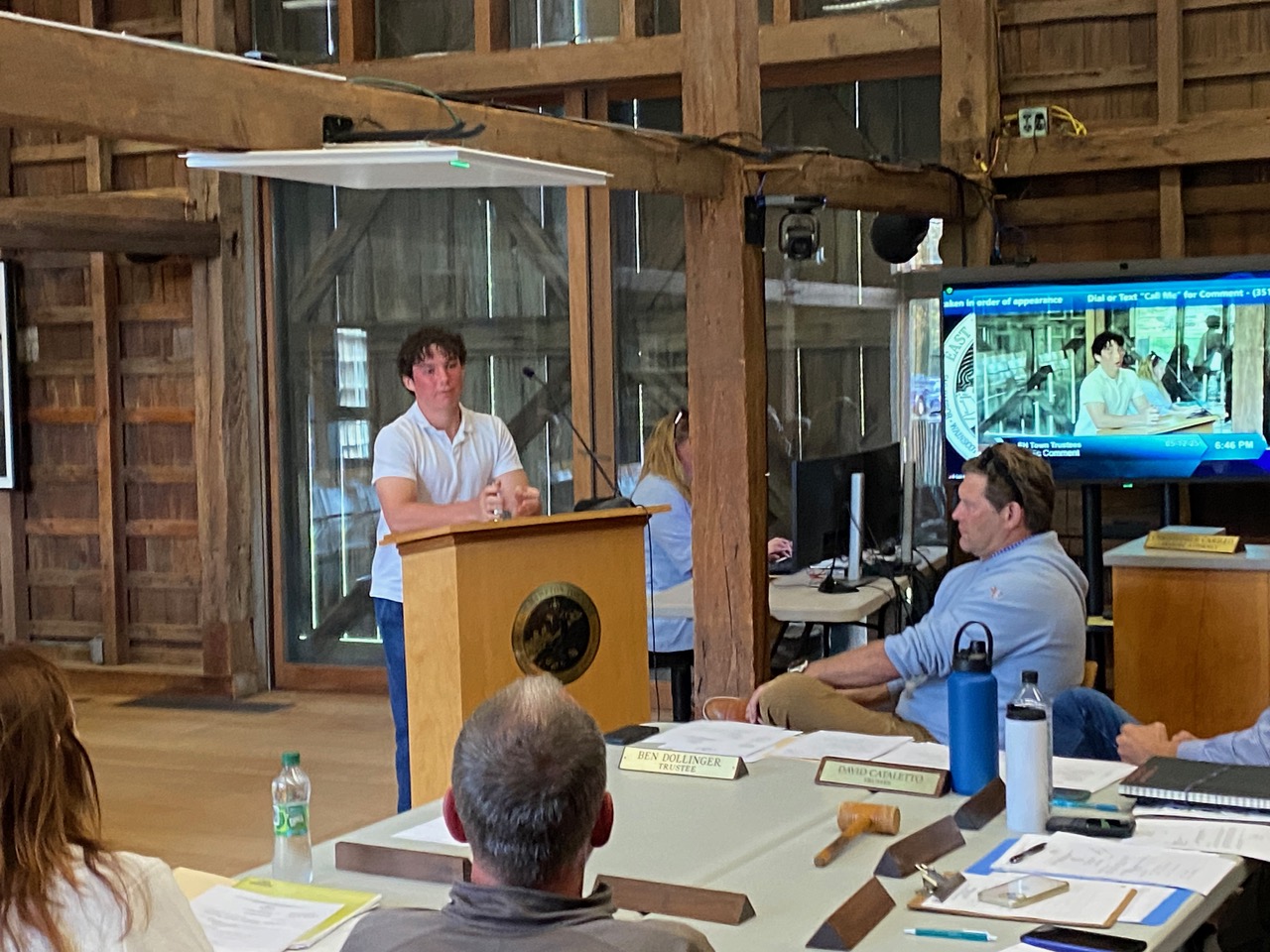 Henry Cooper, an East Hampton High School student, outlined a plan to transplant 20 to 25 shovelfuls of eelgrass from Napeague Harbor to Accabonac Harbor adjacent to previously constructed oyster reefs. Christopher Walsh