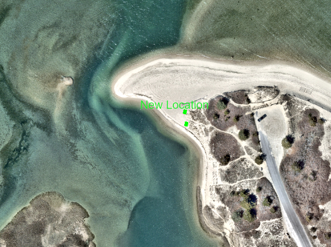 Map of new kayak rack location at Louse Point. Image shows the point with two green lines indicating where the racks will be and the works "New Location."